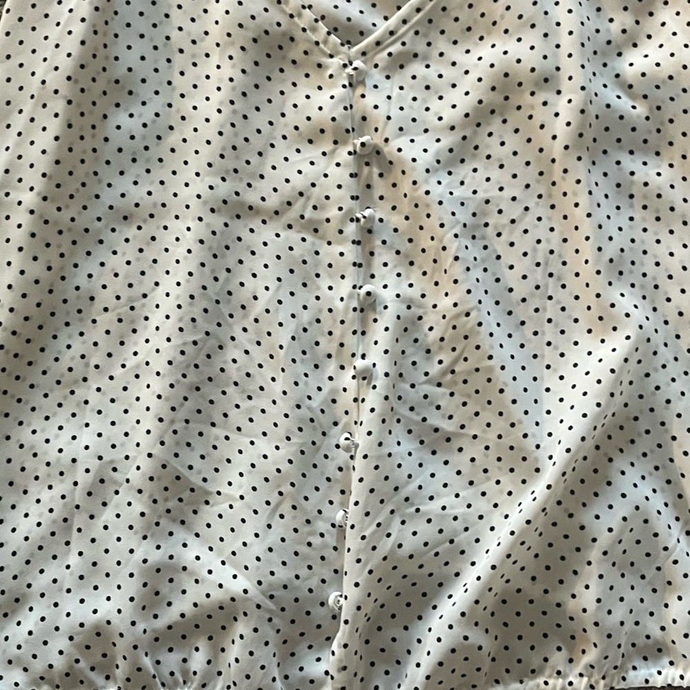 Polka dot shirt black and white.